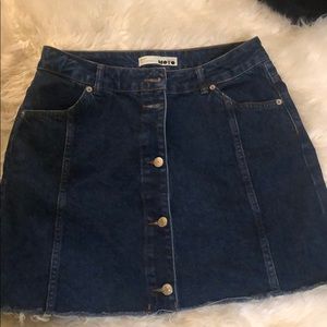 Distressed Topshop mini denim skirt